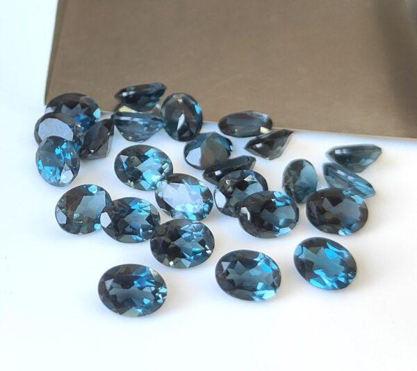Natural London Blue Topaz 12×14 mm Oval Faceted Cut – AAA Quality London Blue Topaz Oval Faceted Cut 12x14mm